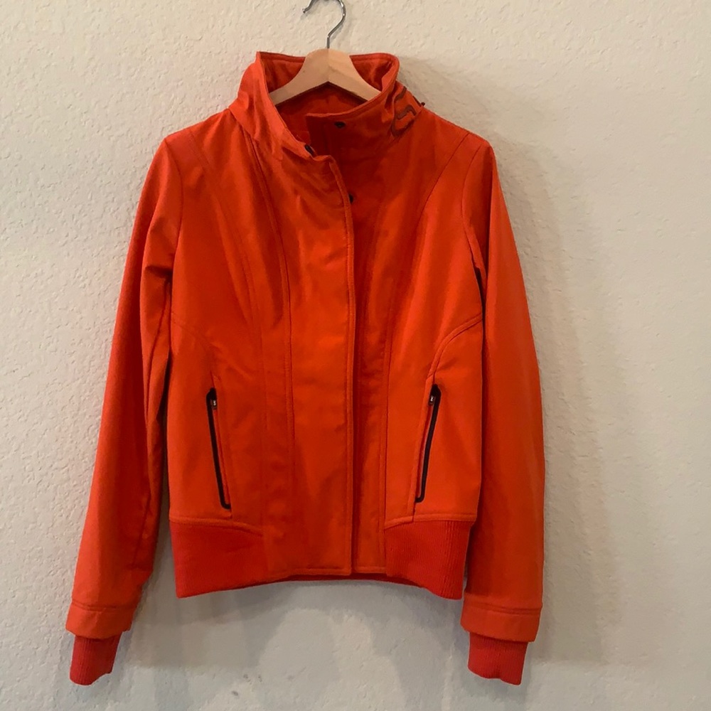 Orange windbreaker jacket